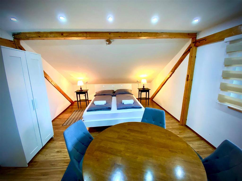 Attic bedroom with wooden beams