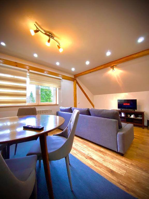 Living and dining area with TV